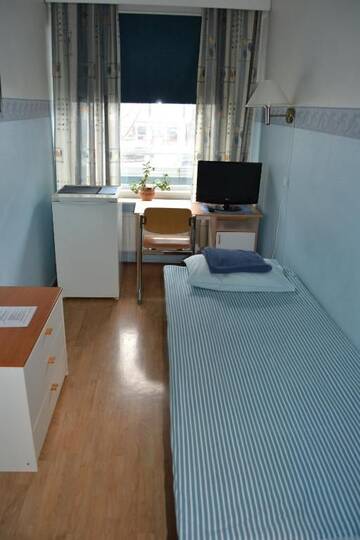Фото номера Одноместный номер с общей ванной комнатой Хостелы Hostel Matkakoti Patria г. Лахти 11