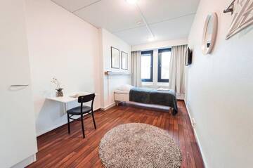 Фото номера Стандартный одноместный номер Апарт-отели Forenom Aparthotel Lahti г. Лахти 7