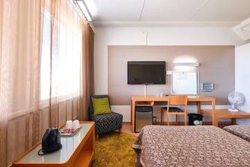 Фото номера Двухместный номер с 2 отдельными кроватями Отель GreenStar Hotel Lahti г. Лахти 5
