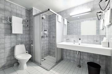 Фото номера Двухместный номер с 2 отдельными кроватями Отель GreenStar Hotel Lahti г. Лахти 6