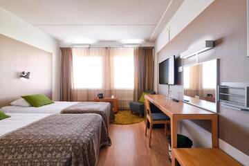 Фото номера Двухместный номер с 2 отдельными кроватями Отель GreenStar Hotel Lahti г. Лахти 4